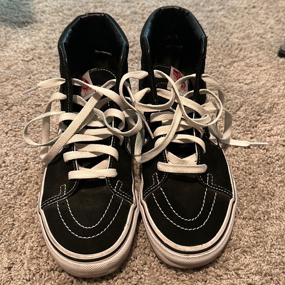 Women’s black high top vans